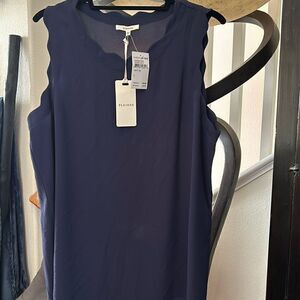 New navy shell tank with scallop sleeves